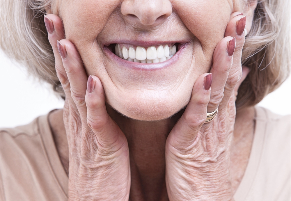 Close up view on senior dentures - Dental Implants in Olympia